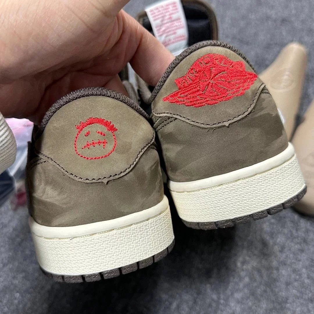 Travis Scott × Air Jordan 1